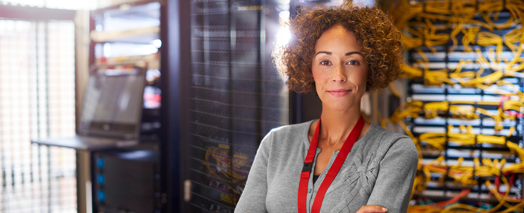 Women smiling in a server room