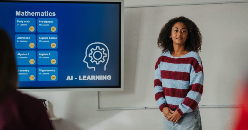 Ai for schools - teacher at front of class with AI on screen